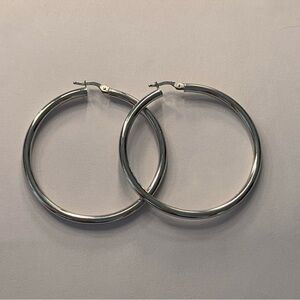 White Gold Earrings (14kt) around 42-50mm in size.